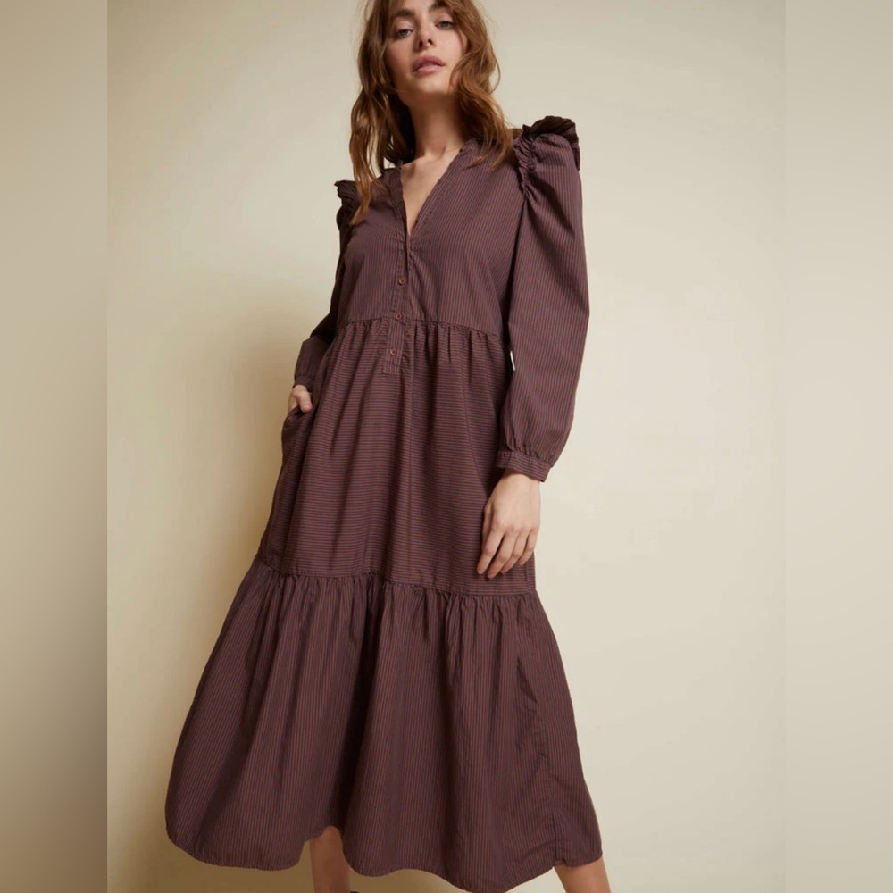 Dalia Victorian Dress With its ruffled shoulder detail